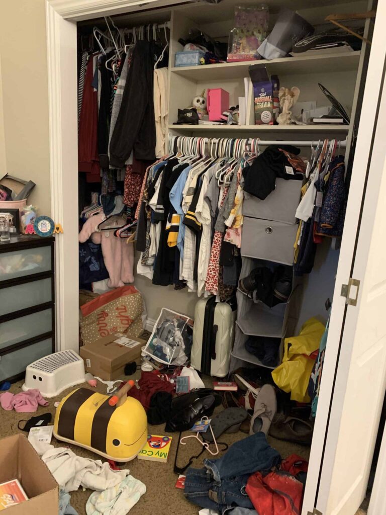 cluttered bedroom closet